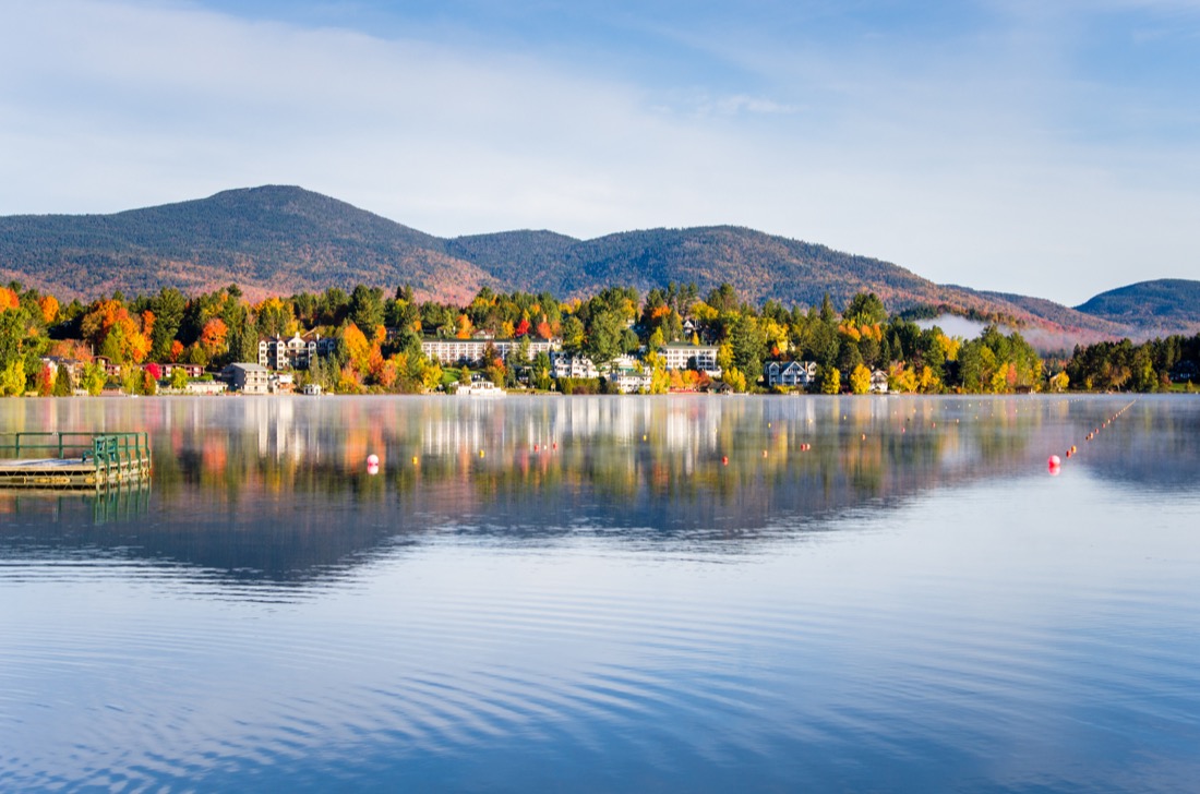 Beautiful village of Lake Placid with fall colors at Adirondack Mountains New York State.