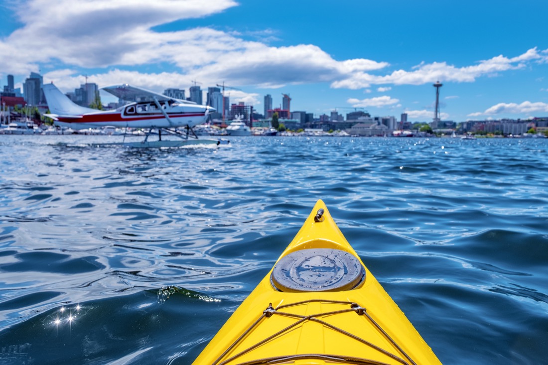 Kayaking in blue waters of Lake Union in Seattle