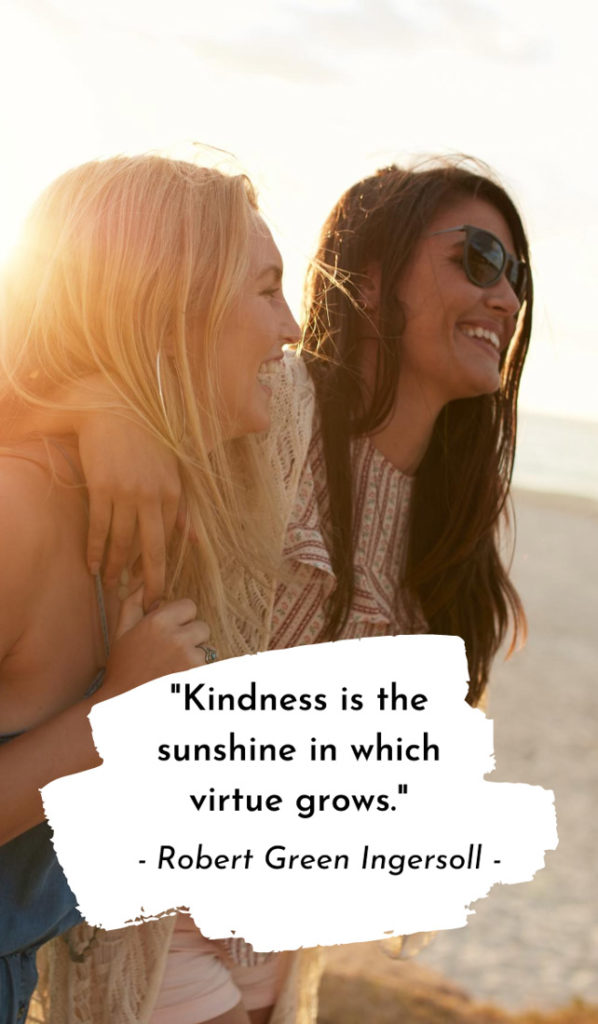 Text Kindness is sunshine which virtue grows. Image of two girls laughing in light sun