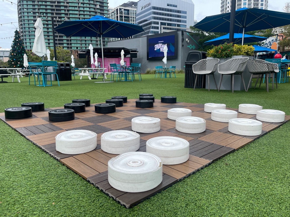 Giant checkers on green grass