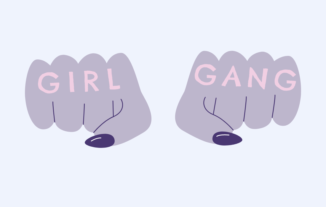 Two fists with girl gang written on them